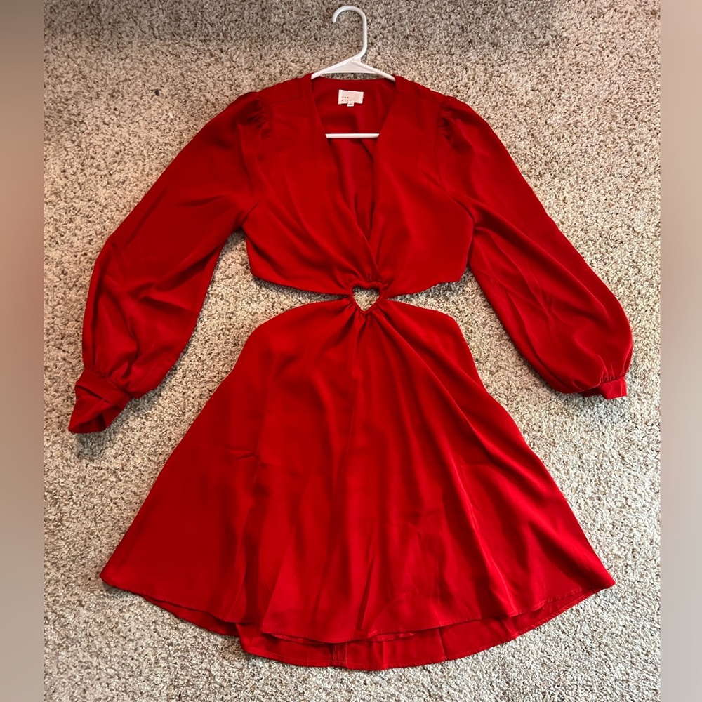 Red midi dress NWOT. Cut out sides.